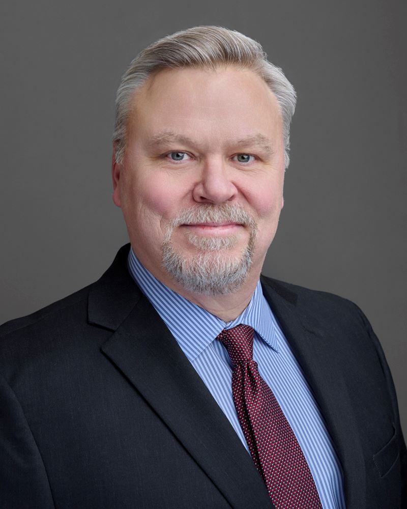 Chris Lily with grey background