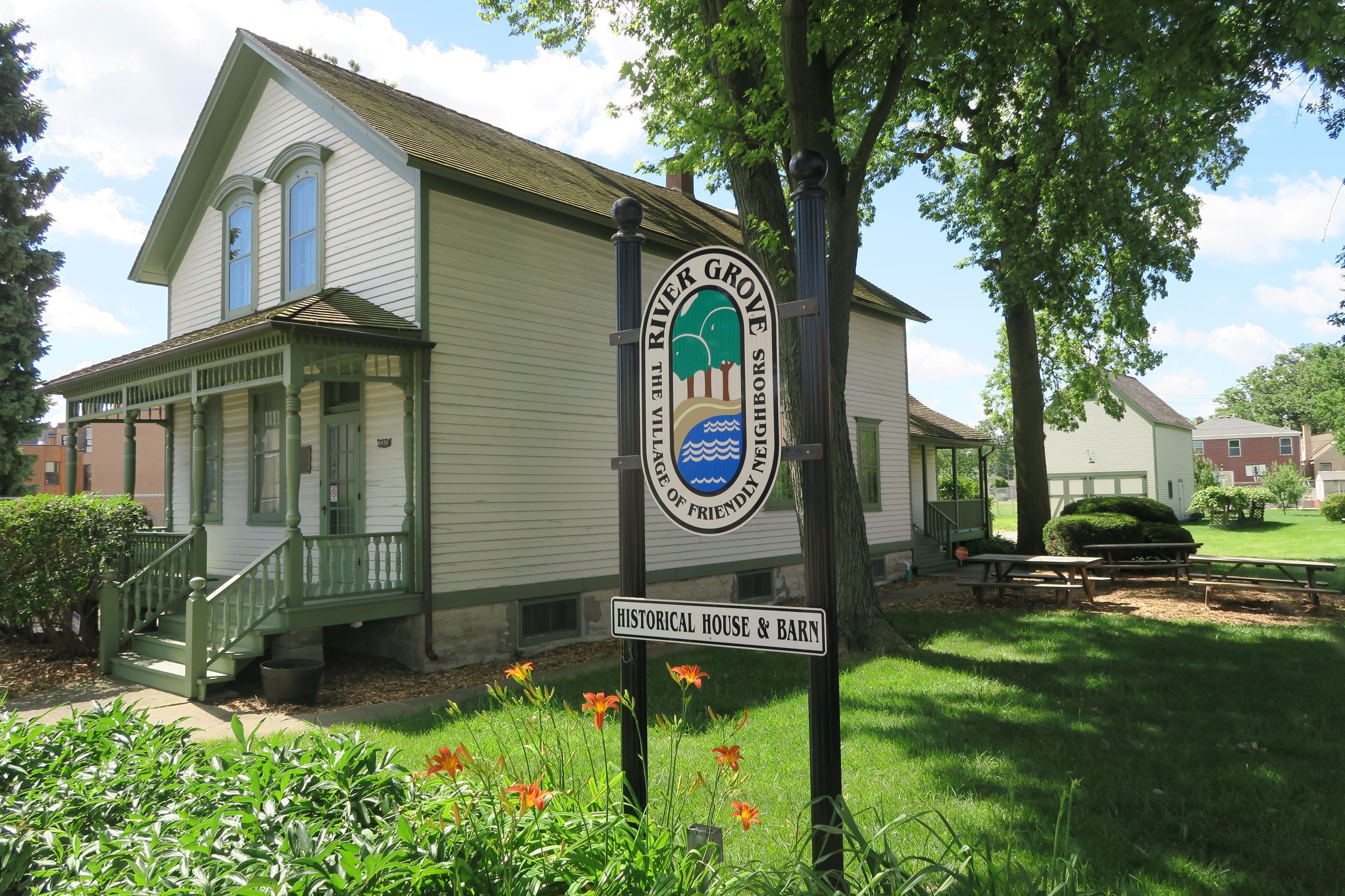 Exterior view of the front and west side of the Historical House