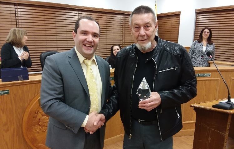 Mayor Guerin presenting Myron Legg with the 2018 Resident of the Year award