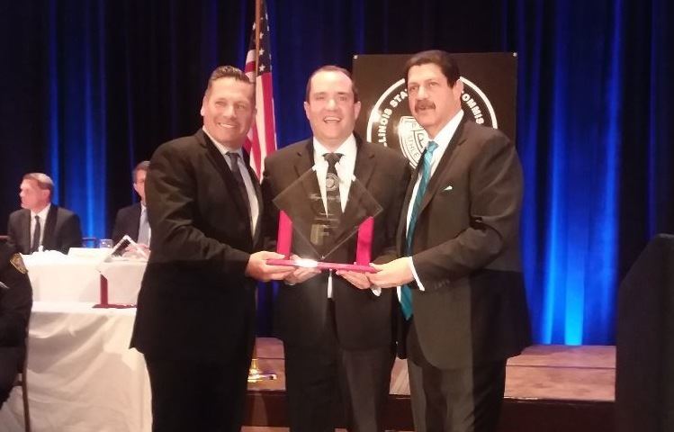 Mayor Guerin receiving the 